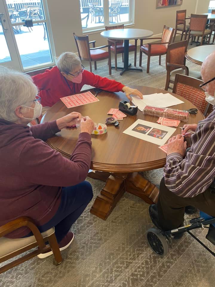 Riley Crossing Dimensions Program residents creating Valentine’s Day cards