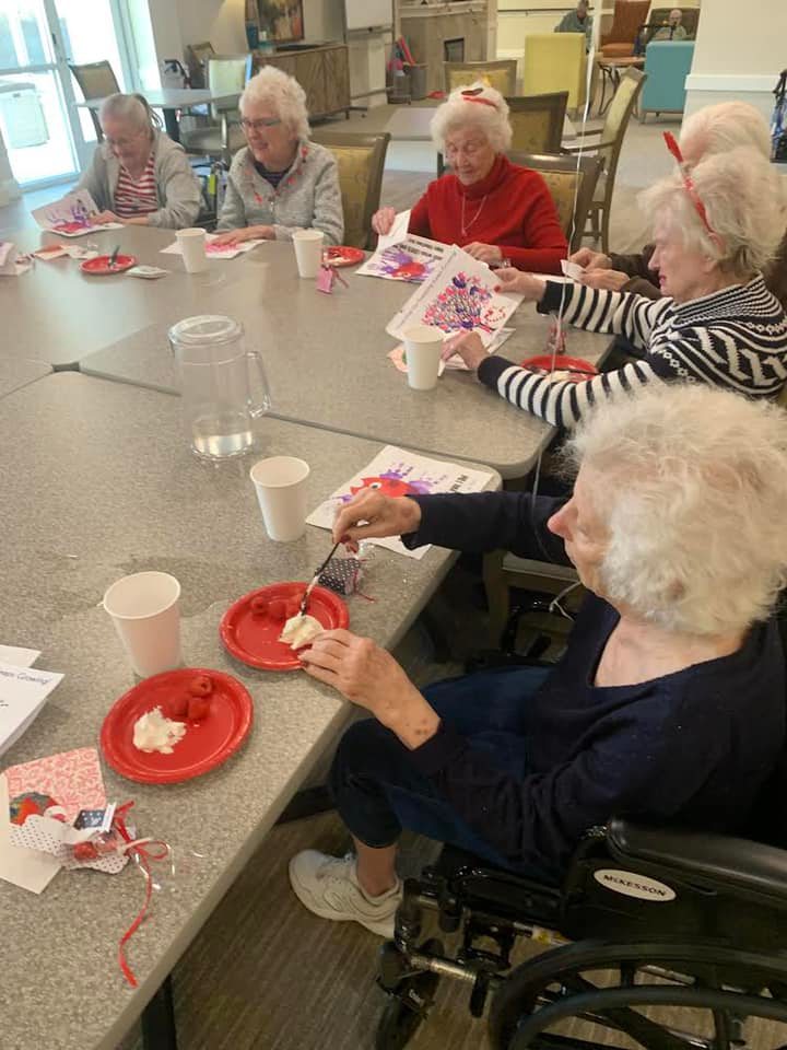 Riley Crossing Senior Living community residents celebrating Valentine’s Day together