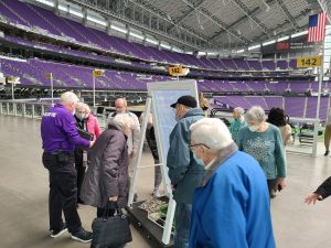 Riley Crossing senior living residents on a tour of the Minneapolis US Bank Stadium
