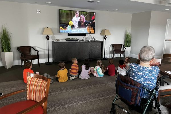 Riley Crossing residents enjoying a virtual concert with the children
